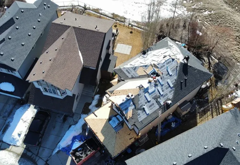 Calgary roof repair specialists fixing storm damaged shingles