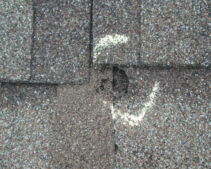 Calgary roof repair specialists fixing storm damaged shingles