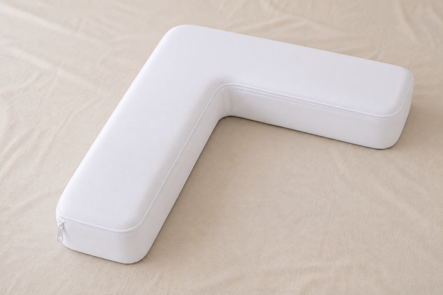 A pair of Cradle pillows framing a bed