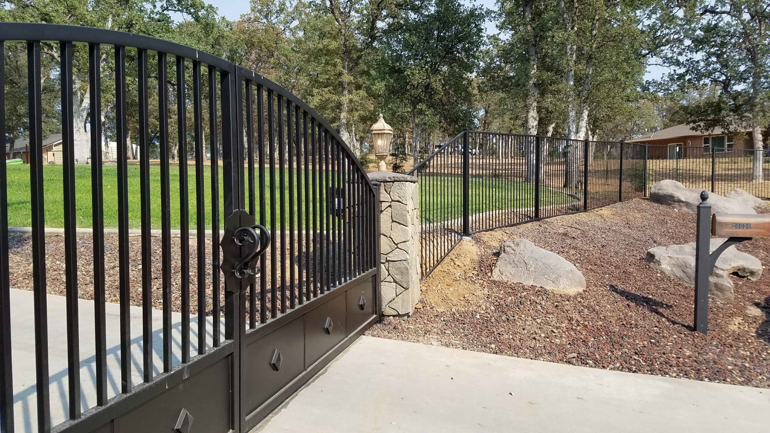 Custom iron driveway gate