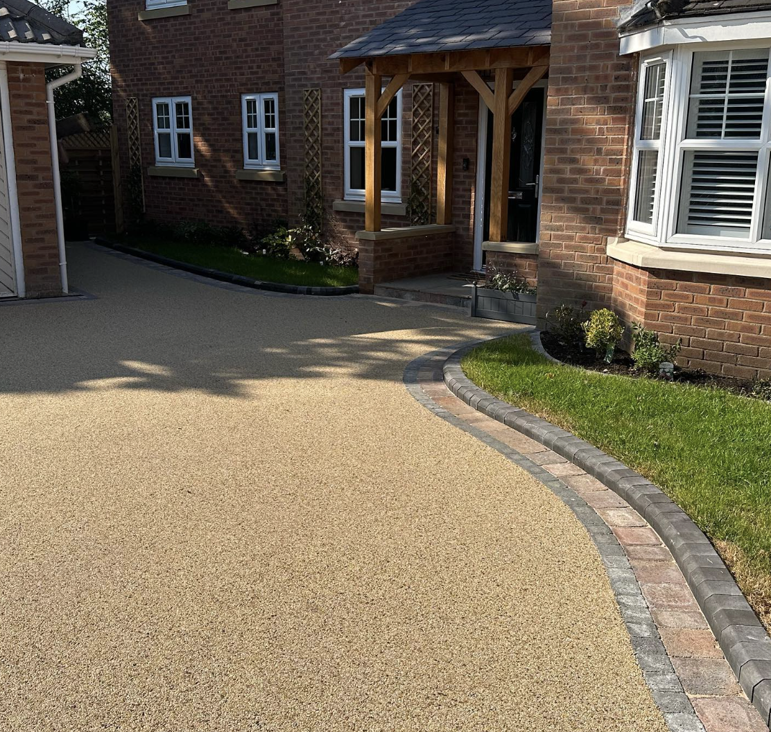 Staffordshire Paving Company team completing a landscaping project