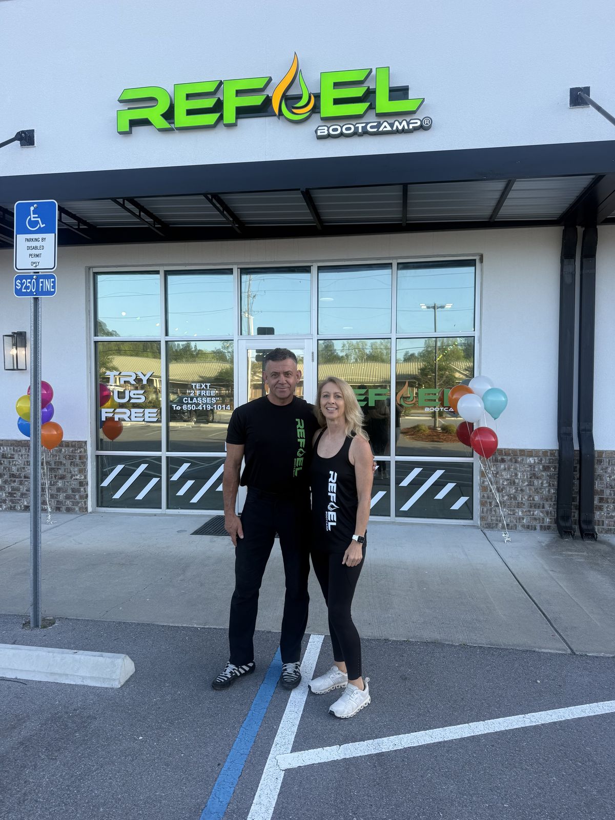 Studio owners Jorge Araujo and Donna Barnett outside REFUEL Bootcamp Freeport