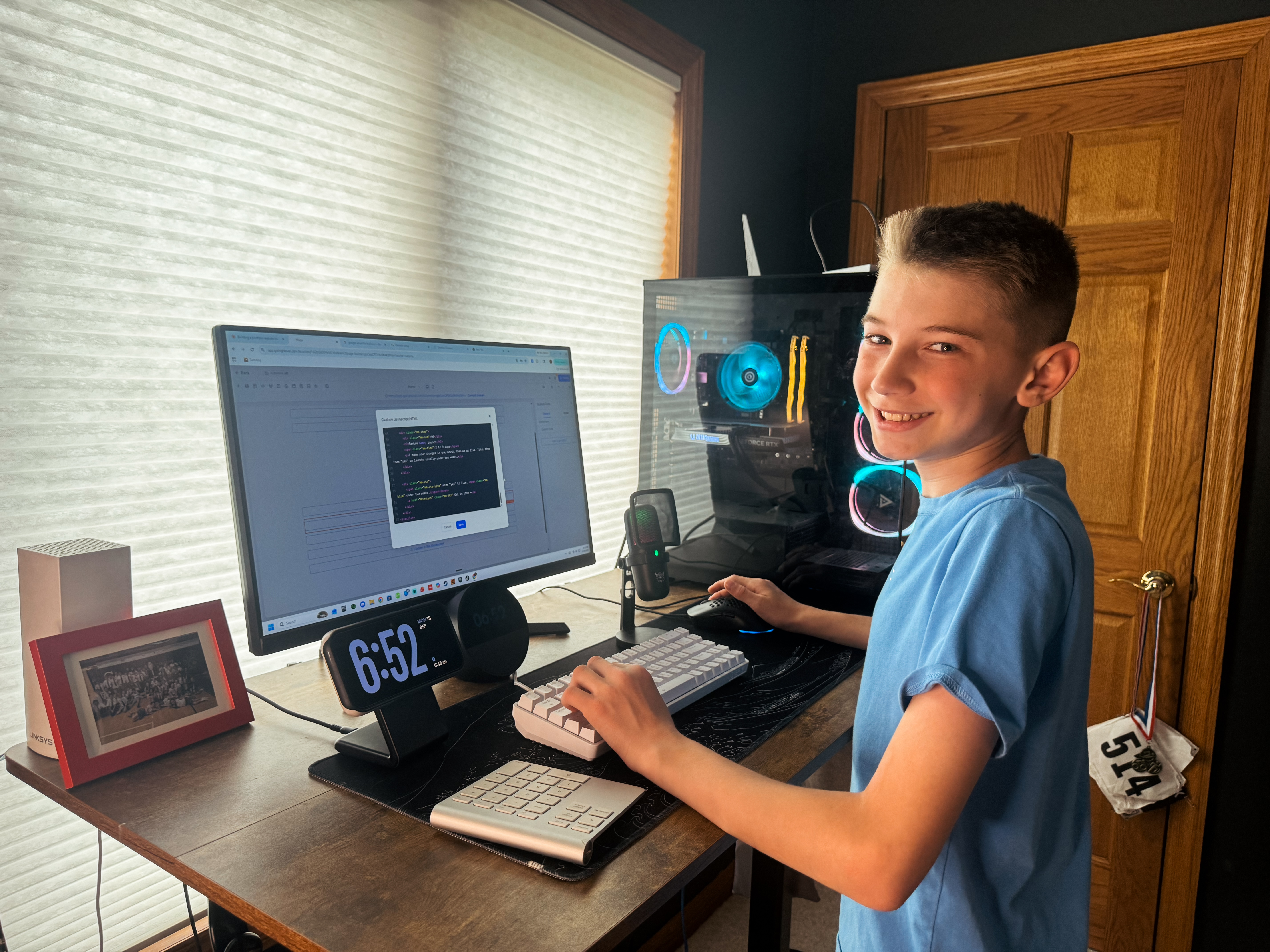 Bryce Maga, founder of MAGA Made LLC, working at his dual-monitor setup