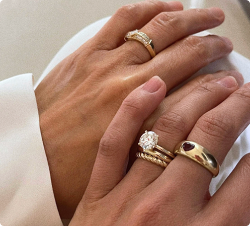 Costa's Fine Jewelry and Coins in Waukesha, WI. Couples hand with jewelry for initial consultation.