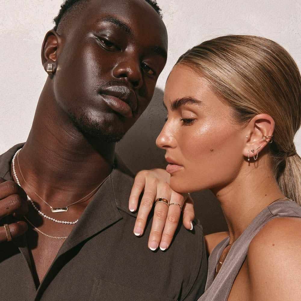 Costa's Fine Jewelry and Coins in Waukesha, WI. Image of man and woman wearing jewelries.