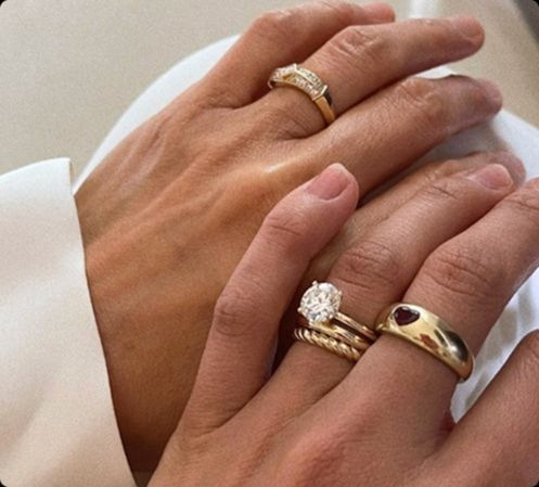 Costa's Fine Jewelry and Coins in Waukesha, WI. Couples hand with jewelry for initial consultation.