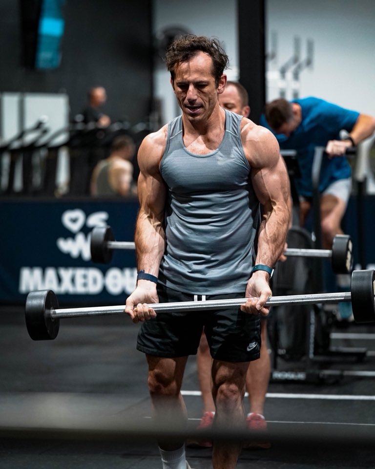 A member mid barbell lift