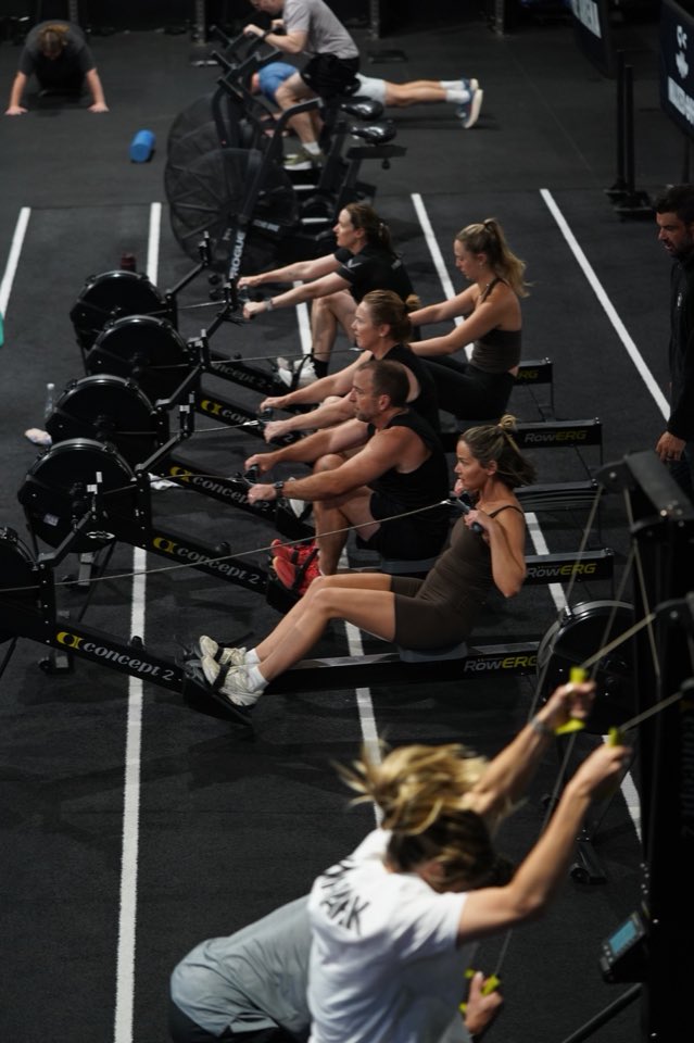 A rowing class seen from above, five rowers in a line