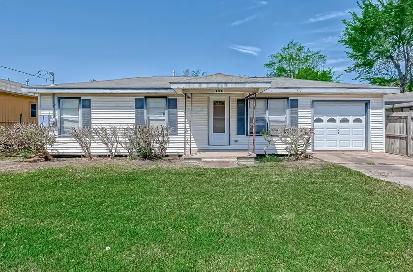 A Houston-area home of the kind Charms Home Buyers purchases for cash