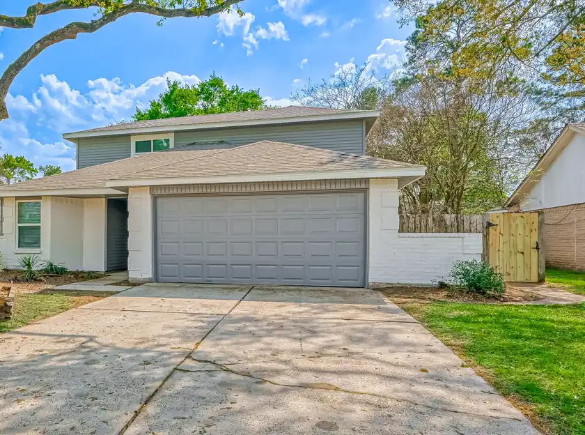 A Houston-area home of the kind Charms Home Buyers purchases for cash
