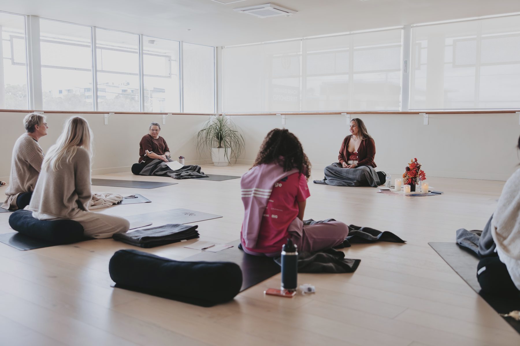 Women sitting together in circle at The Circle of the Phoenix