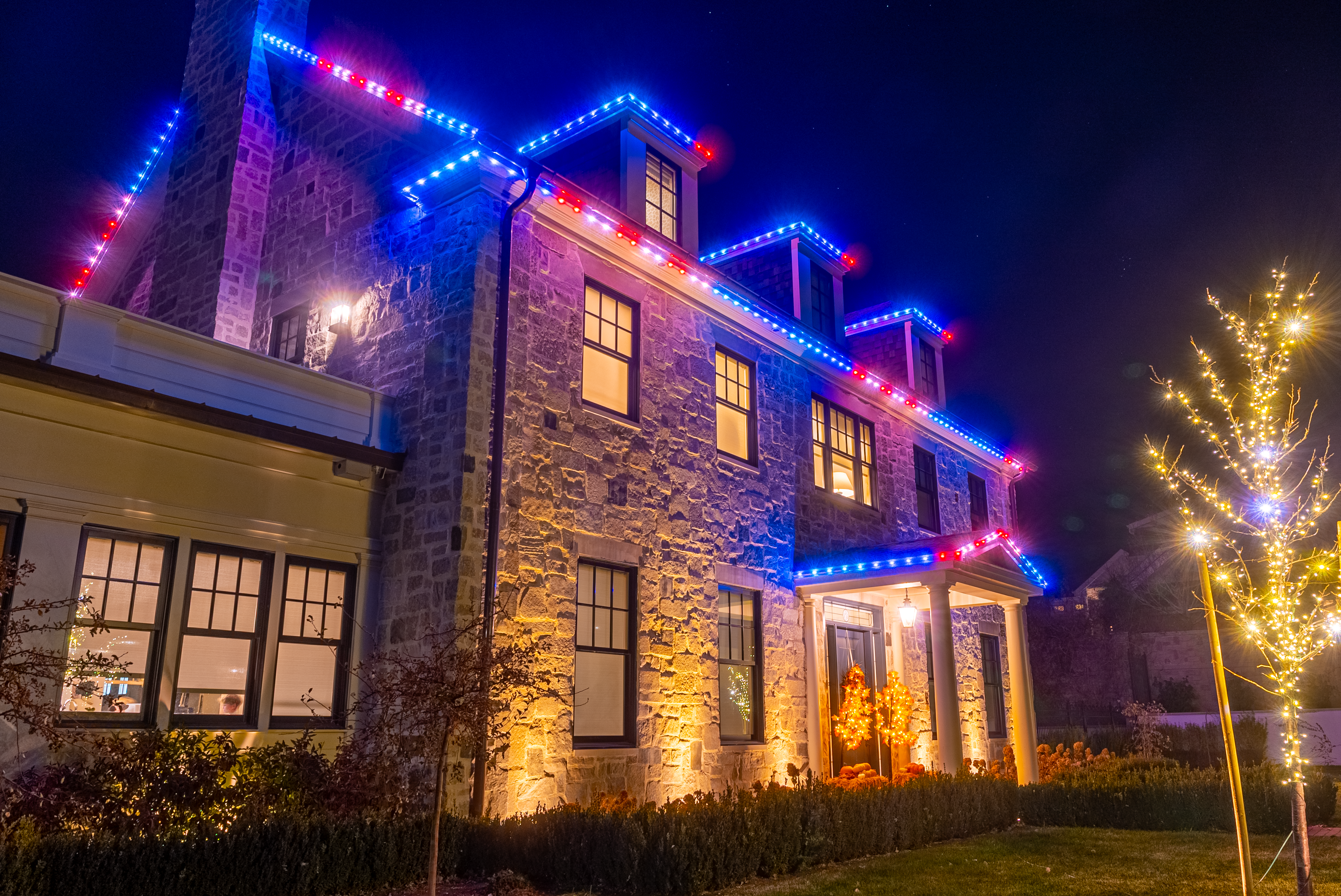 Patriotic red white blue permanent LED lighting by Aggie Elite Services