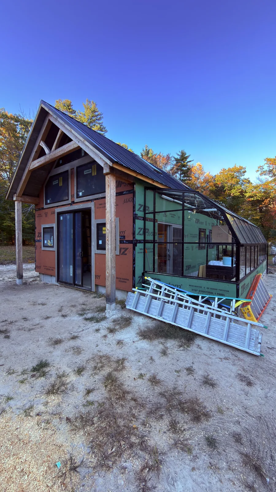 Post and beam building under construction in Oxford County, Maine