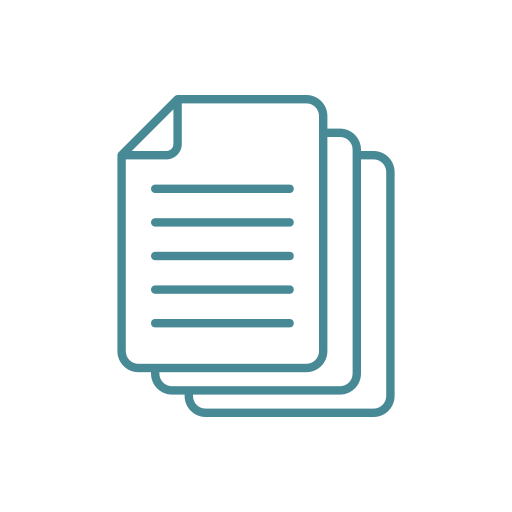 Stack of important documents being reviewed and organized on a desk with a laptop and pen nearby for reference.