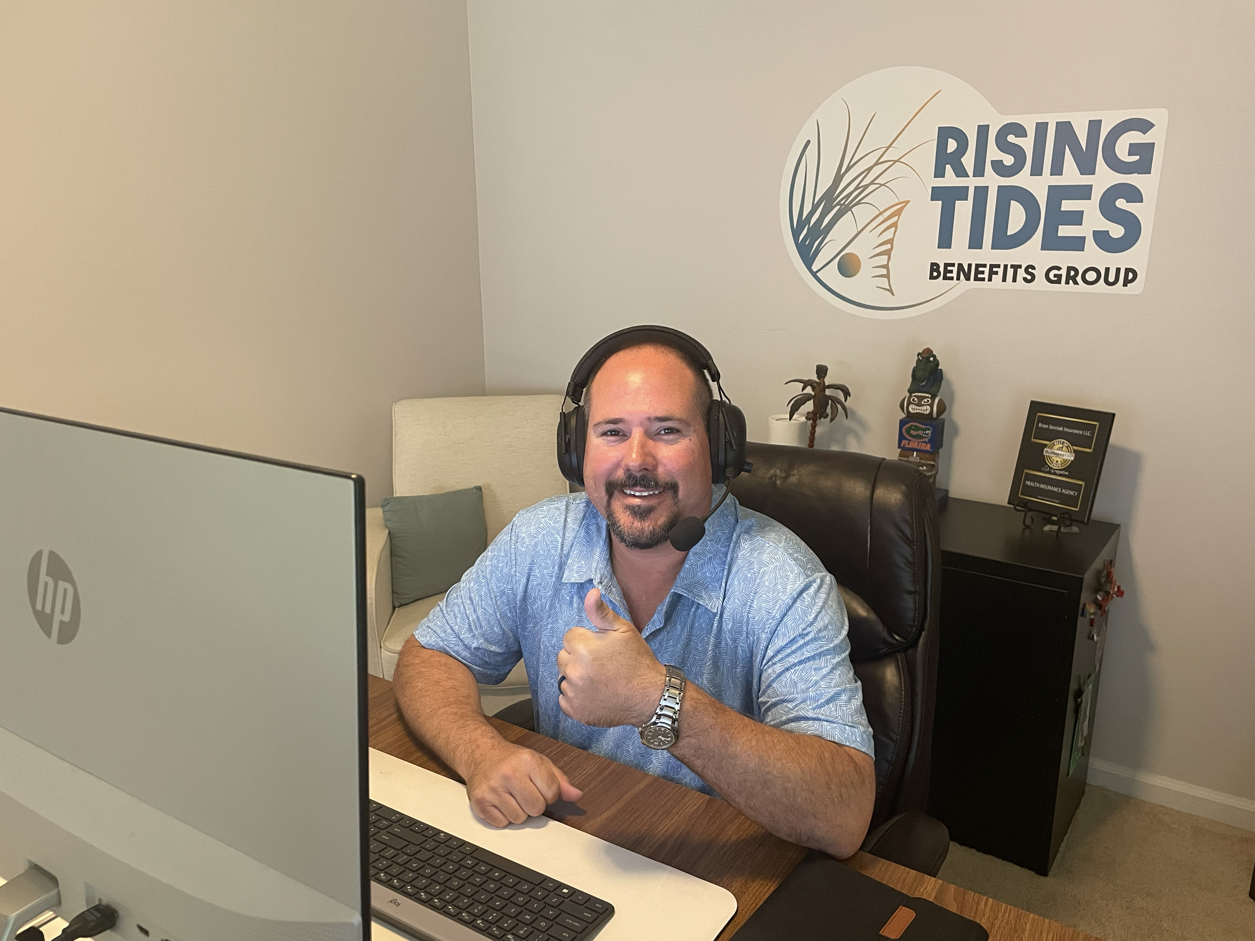 Florida owner reviewing ACA Marketplace health insurance options with family..