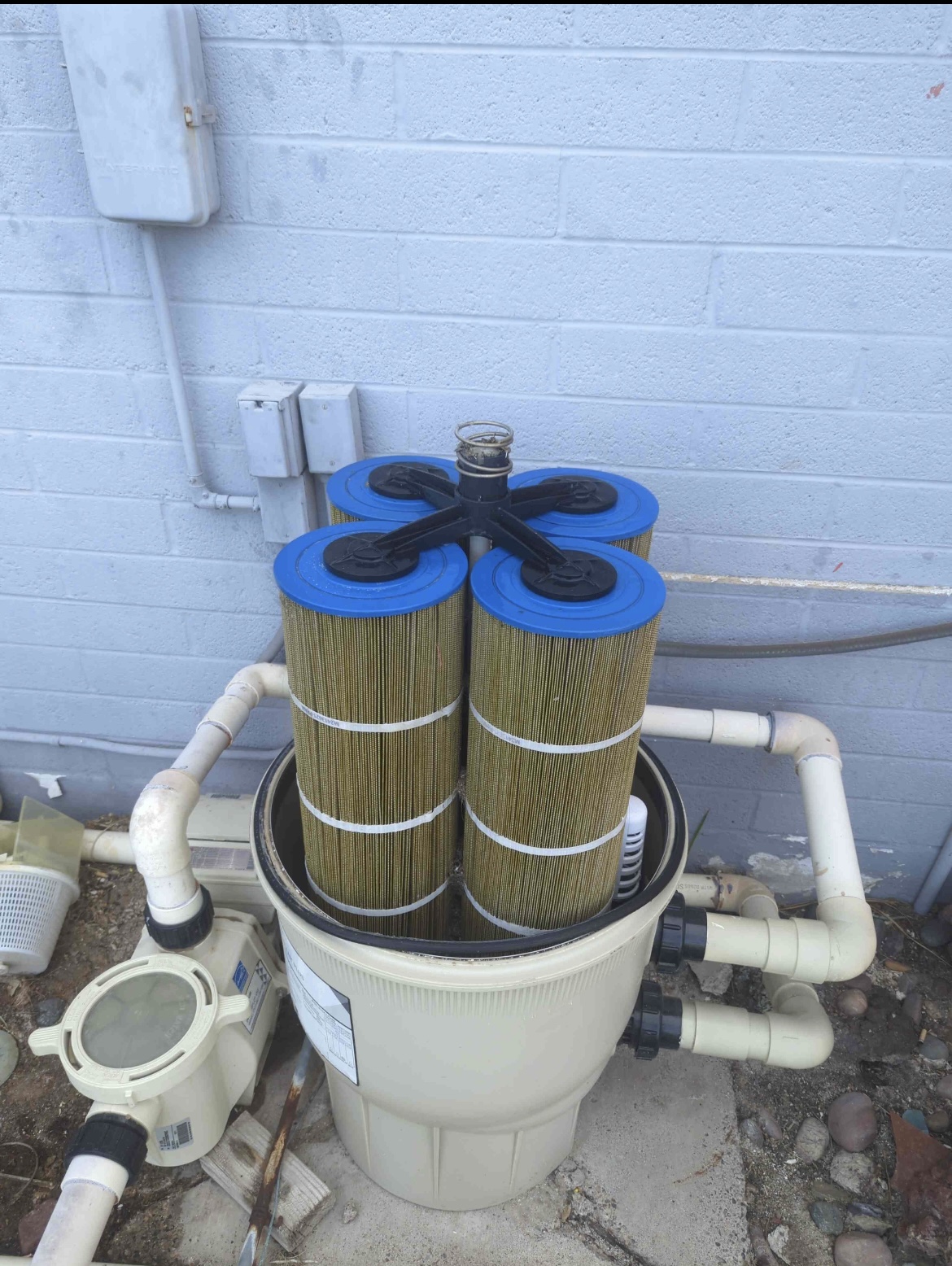 Dirty, debris-caked pool filter cartridges before Drift Pool Co. filter cleaning service
