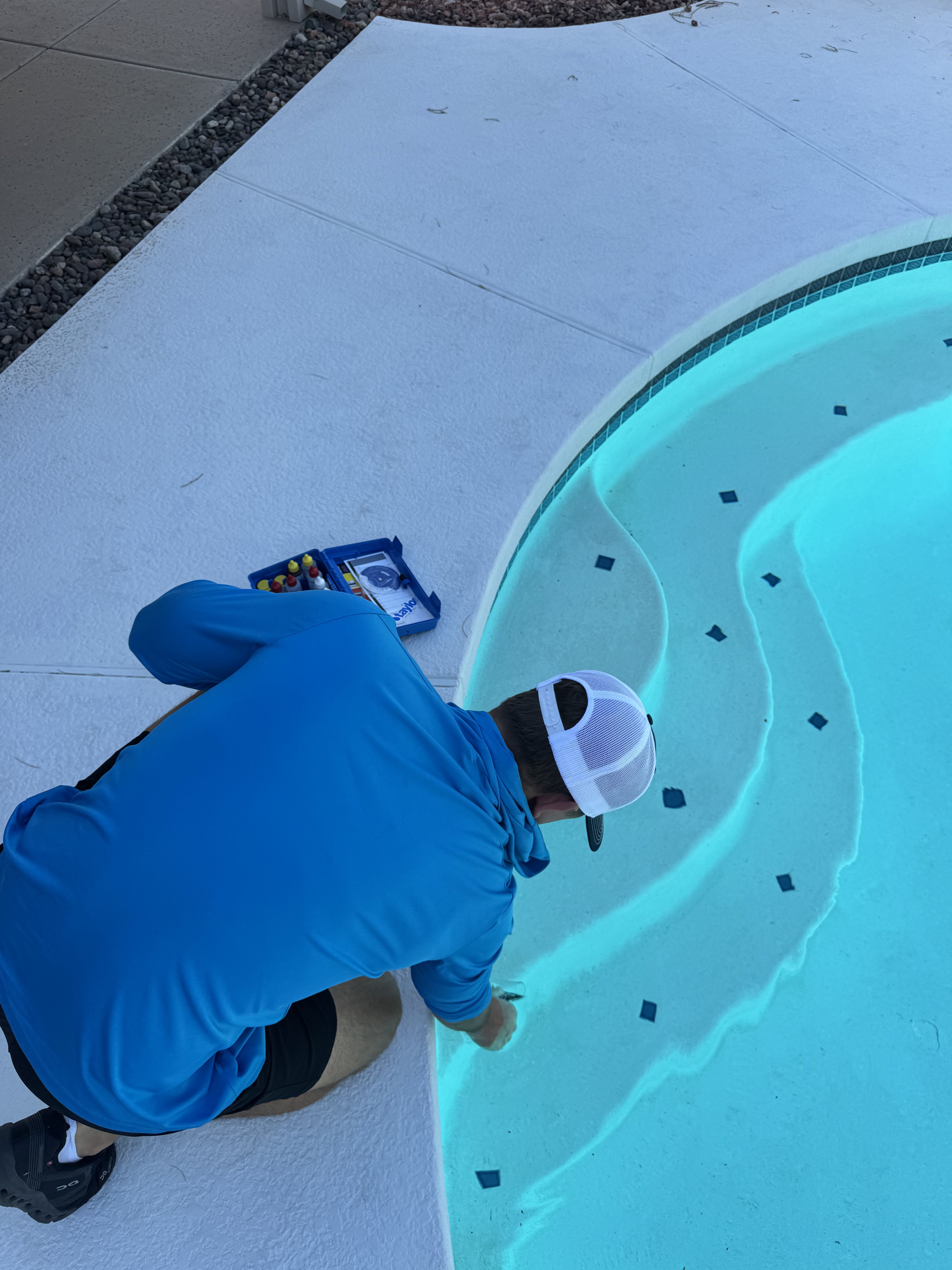 Colton testing pool water chemistry up close in Scottsdale, Arizona