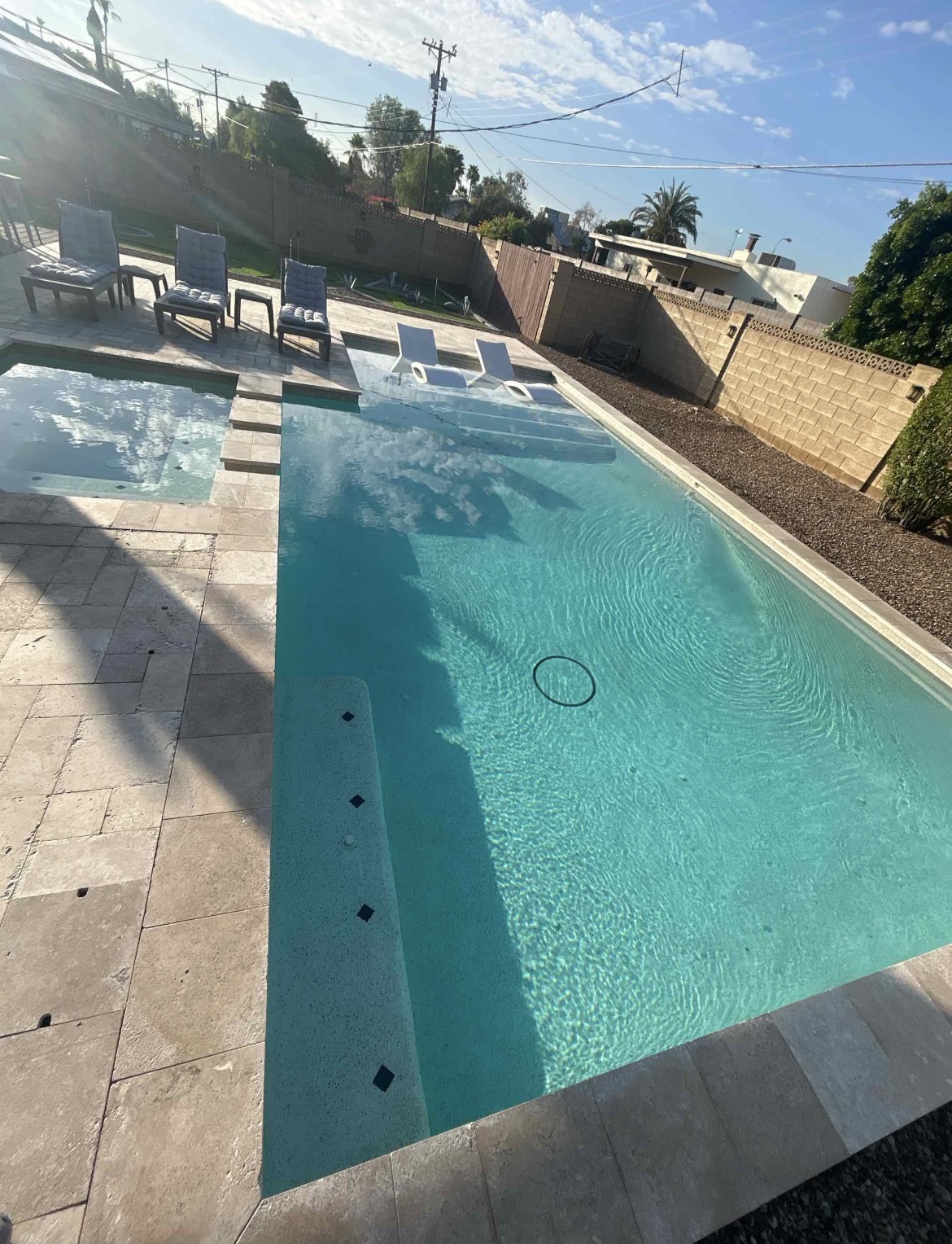 Backyard pool sparkling clear after Drift Pool Co. Green-to-Clean service