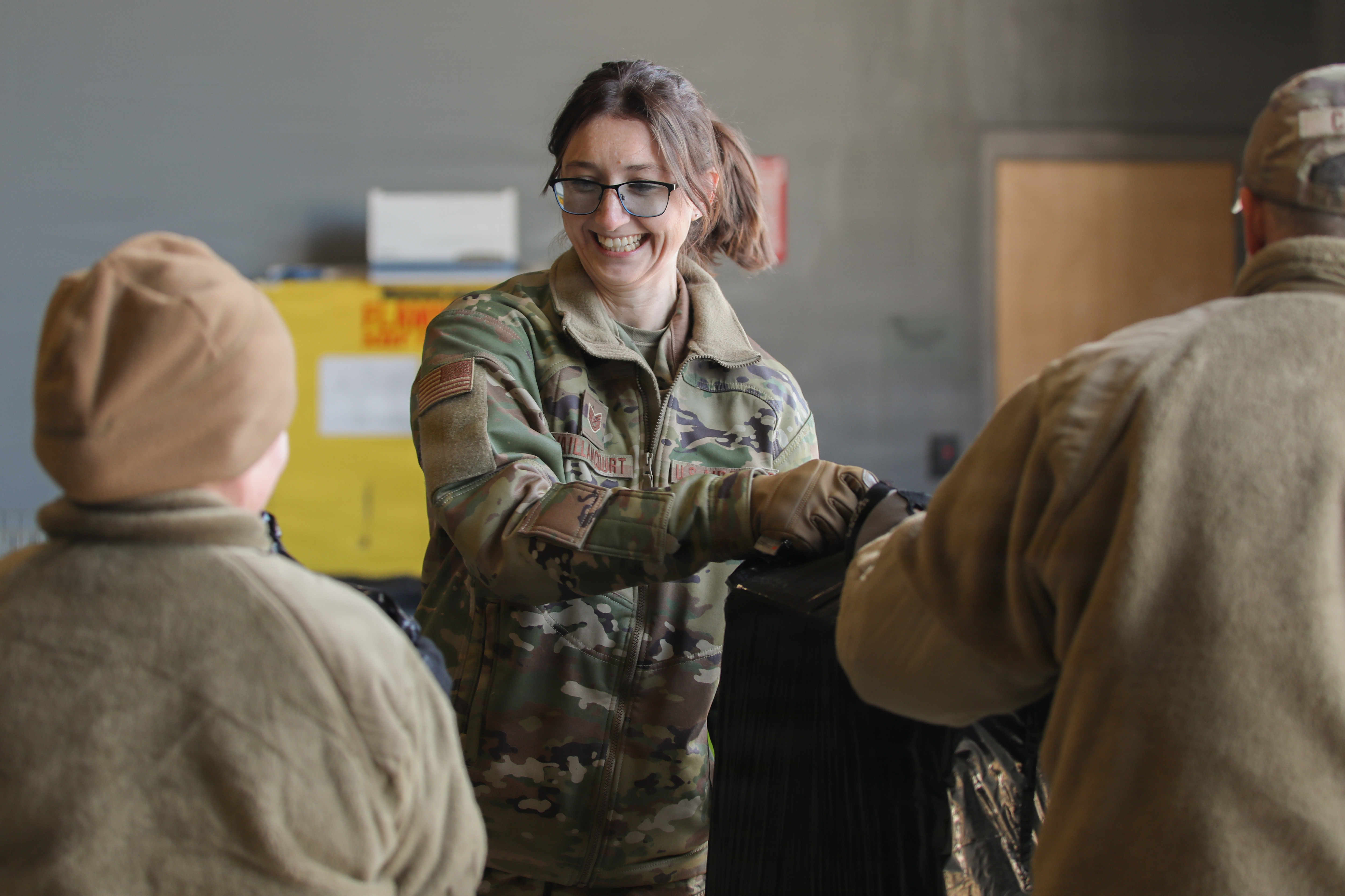 Service members interacting during a community activity