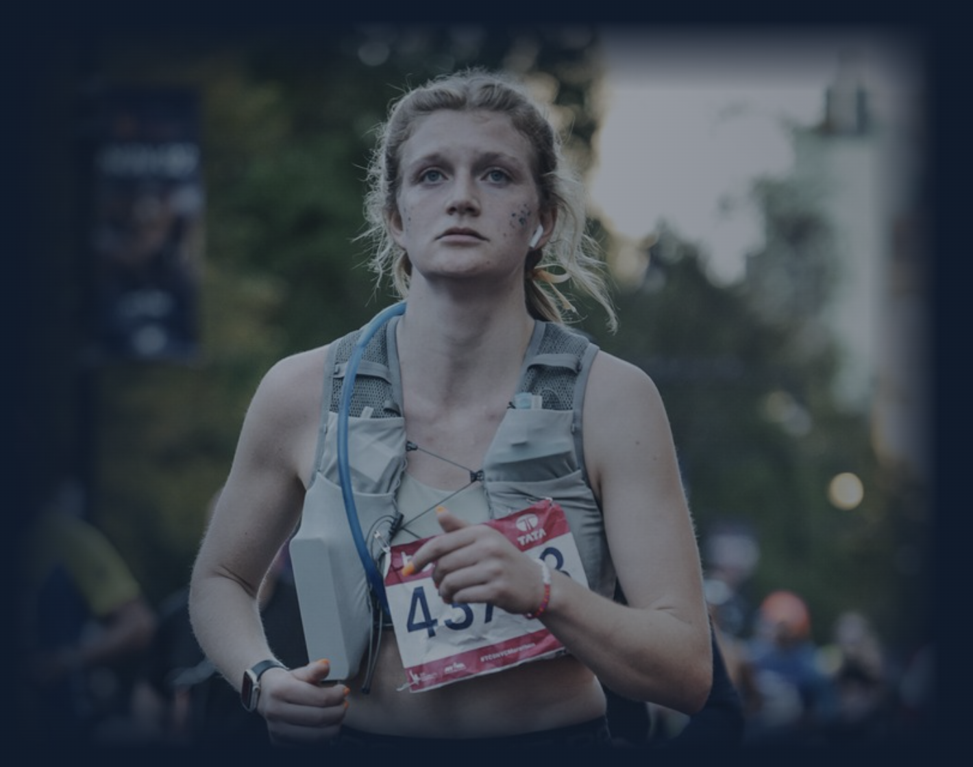 A distance runner in the closing stages of a road race