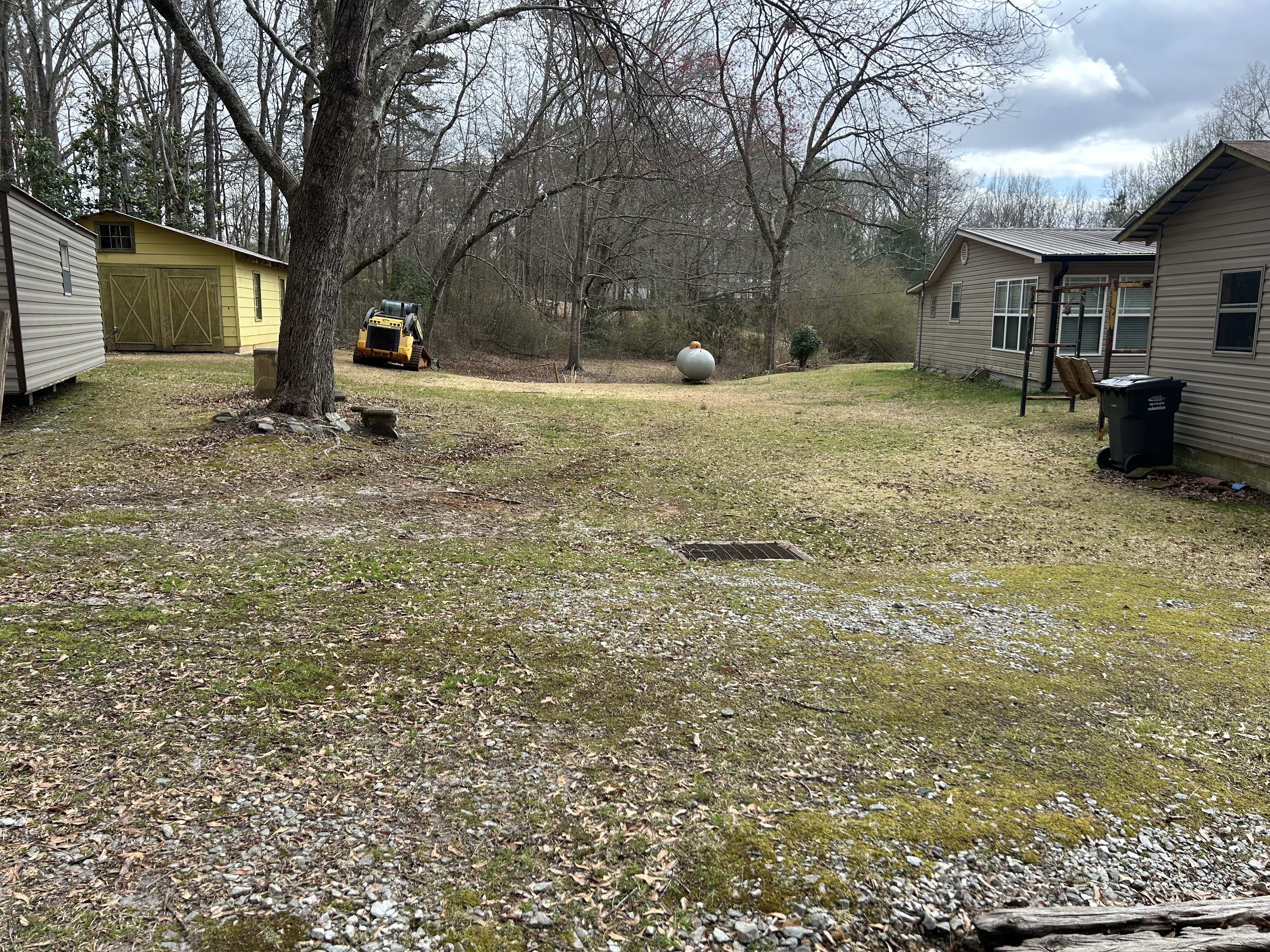 Yard with drainage problems before grading