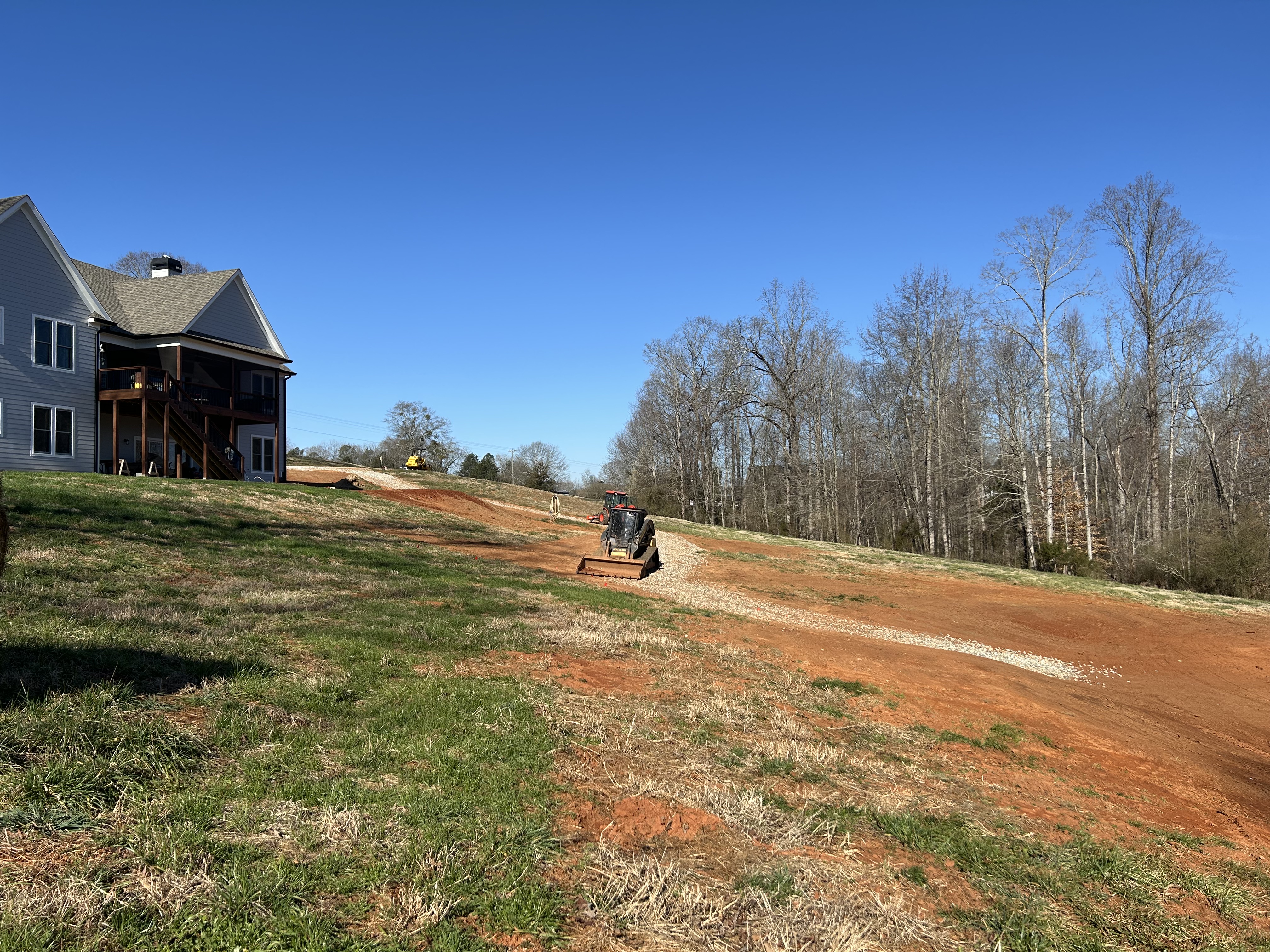 New home final grading skid steer