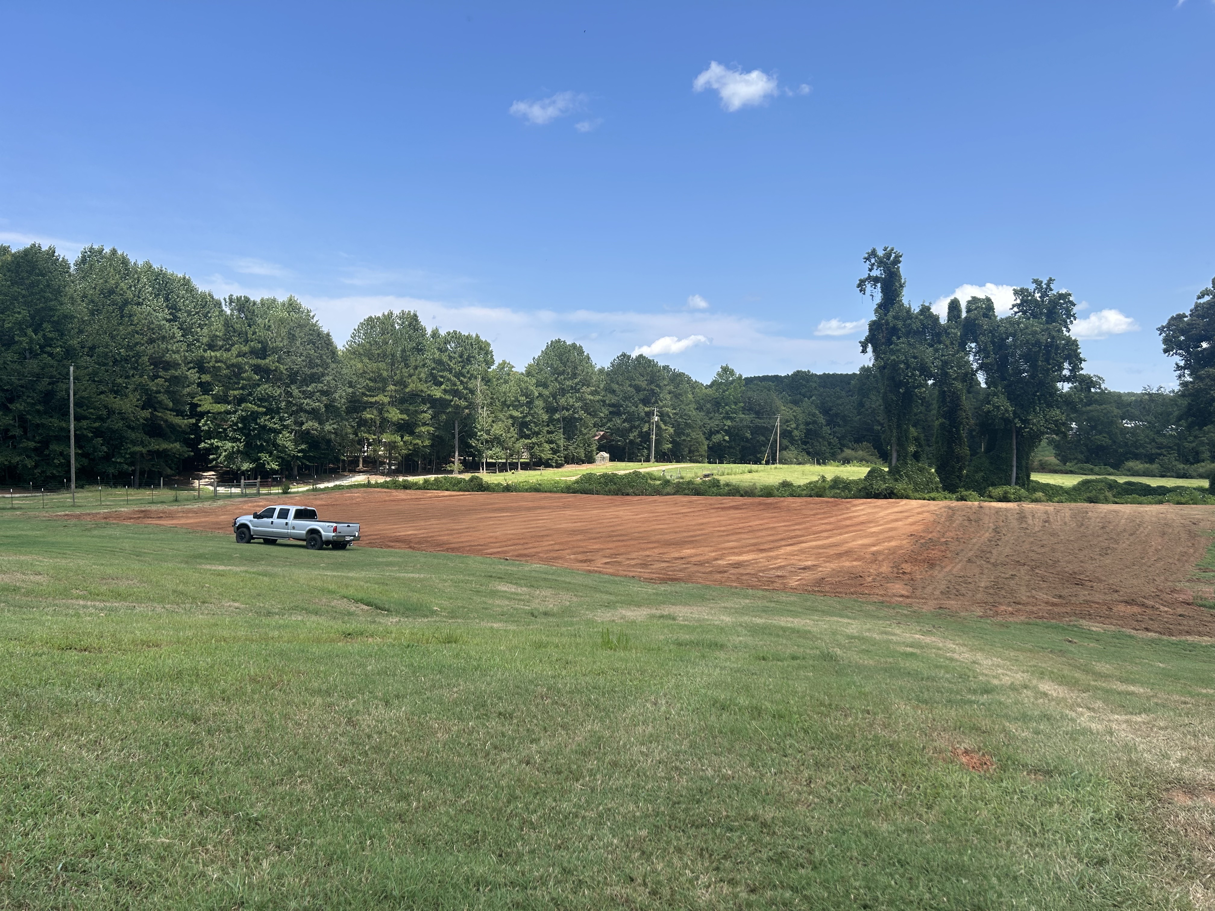 Graded pad in a pasture