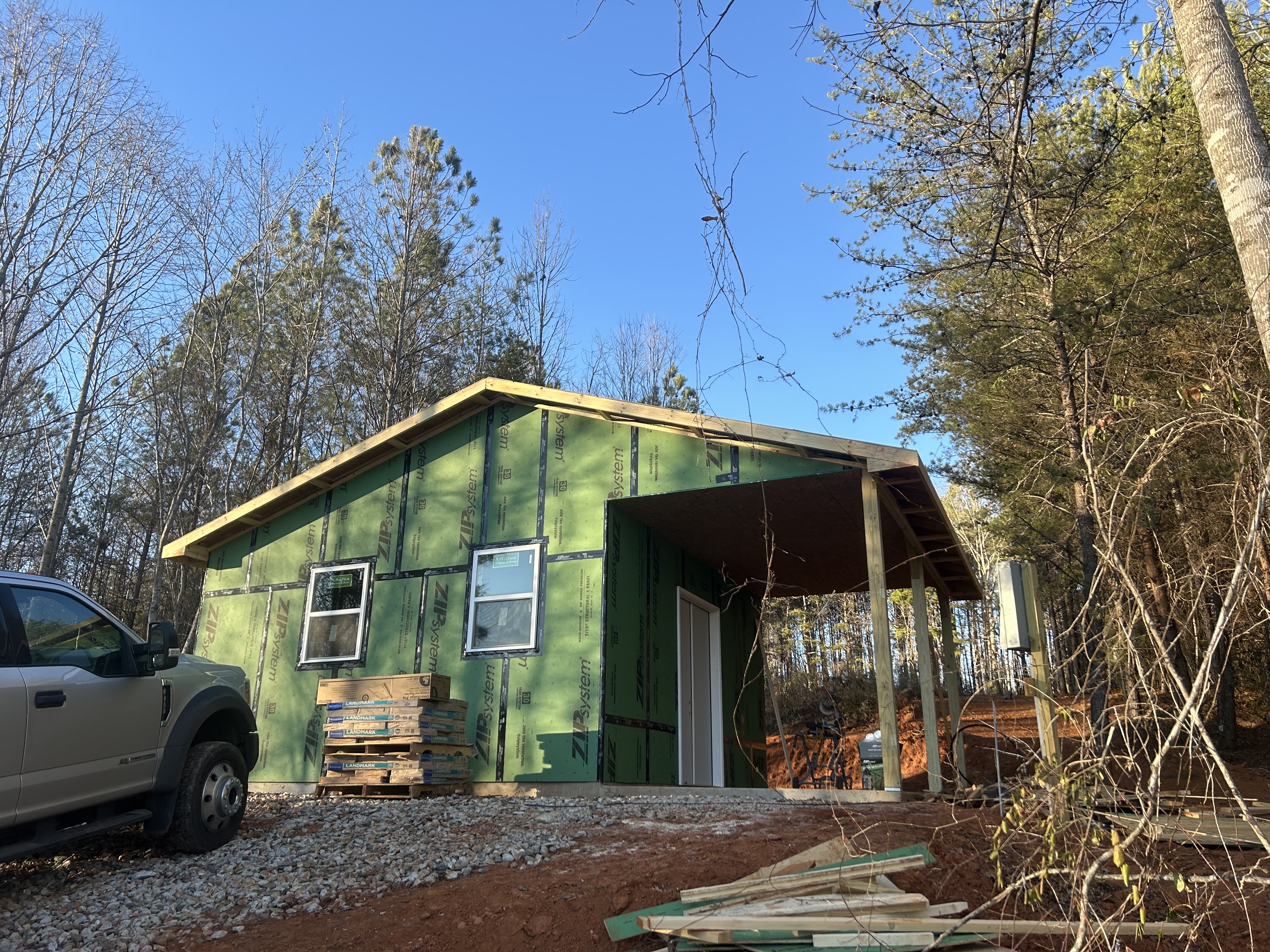 Pole barn getting its metal sheathing