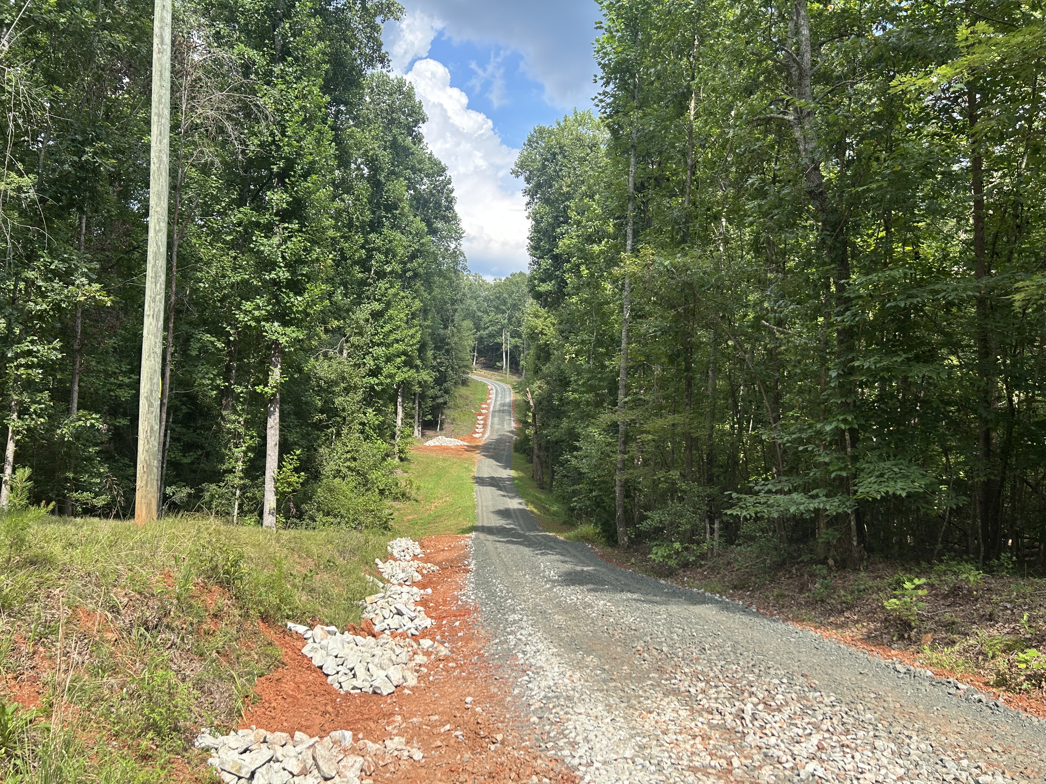 Long gravel driveway rip rap