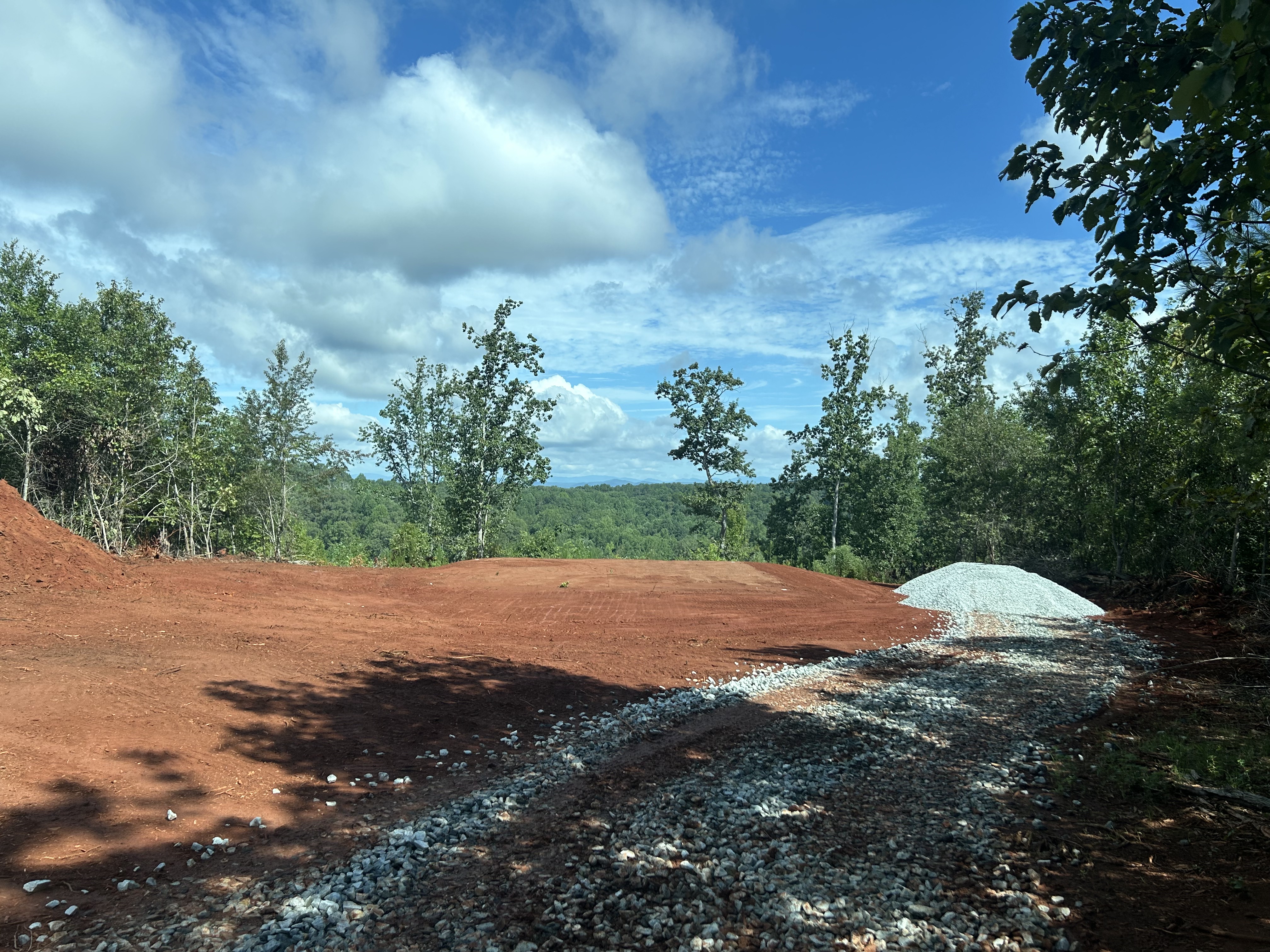 Home site pad topped with gravel