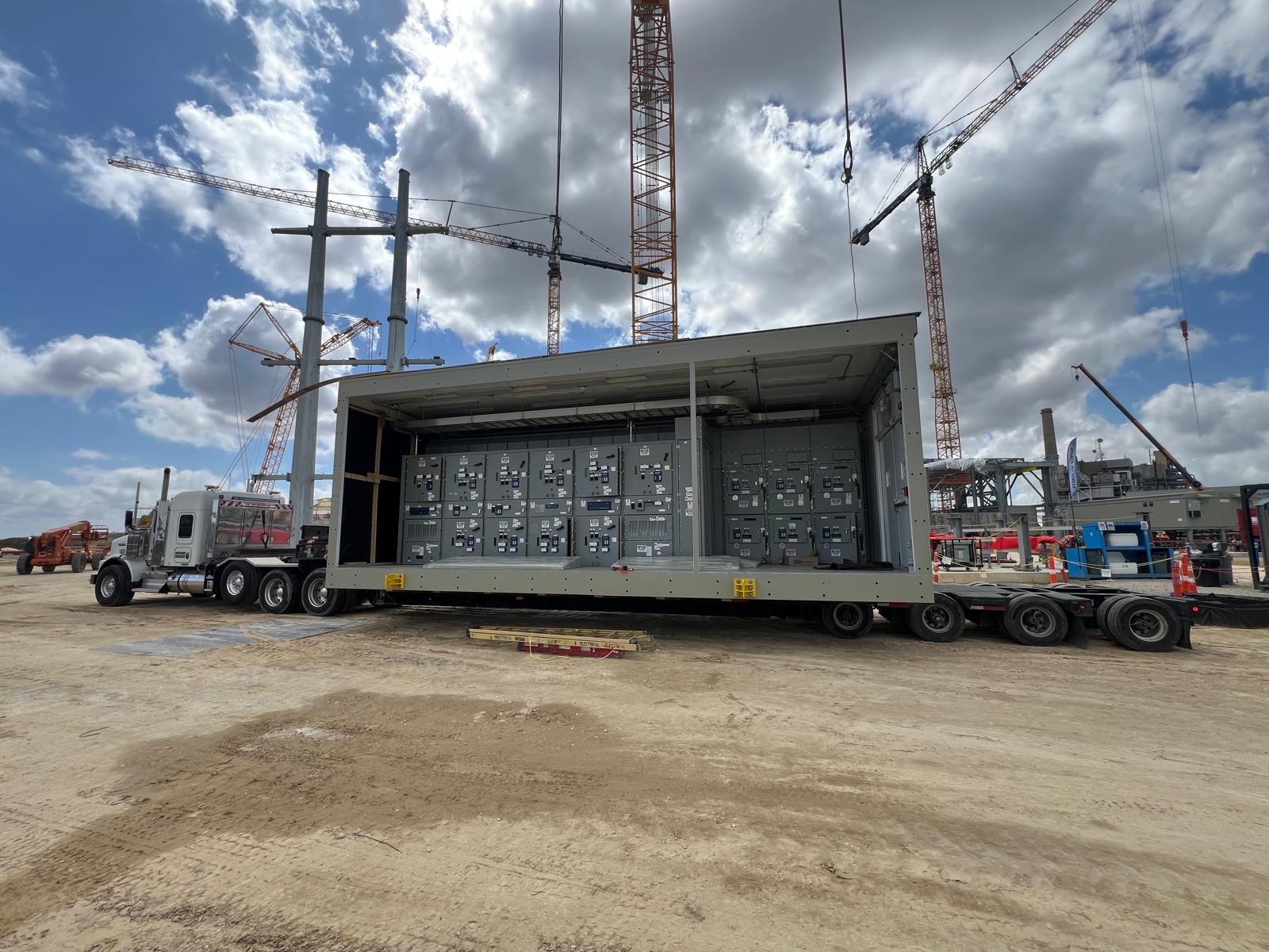 Heavy haul trailer transporting construction machinery