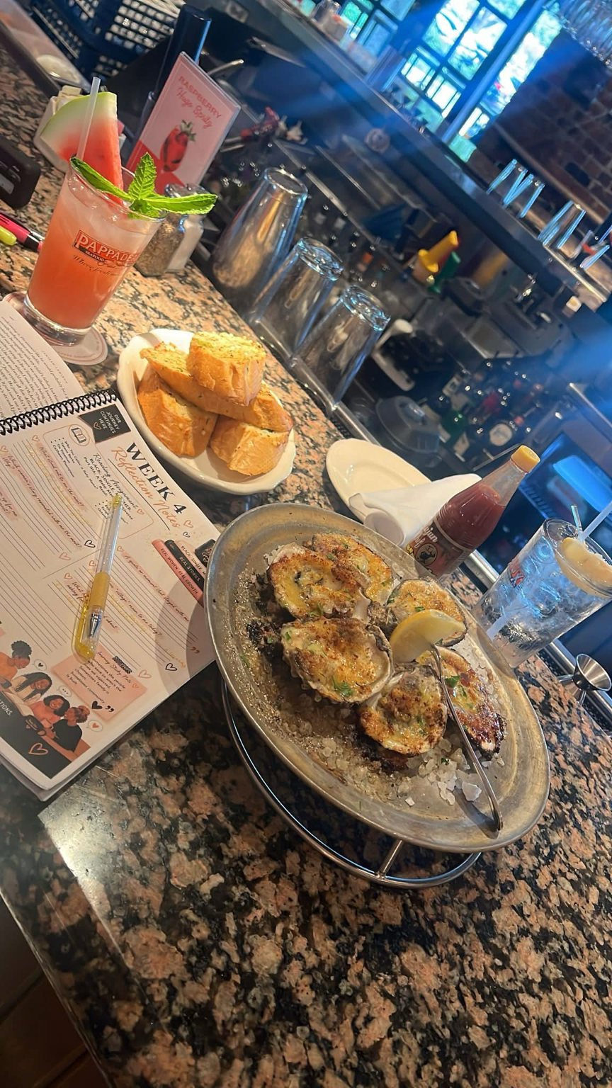 Book club journal and dinner on the table