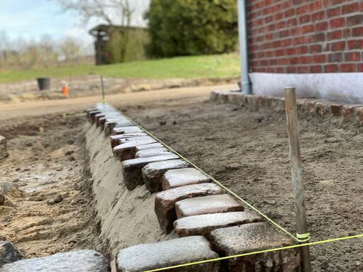 Trockenmauer aus Naturstein im Garten von TB-Gartenreich in Ahlefeld-Bistensee