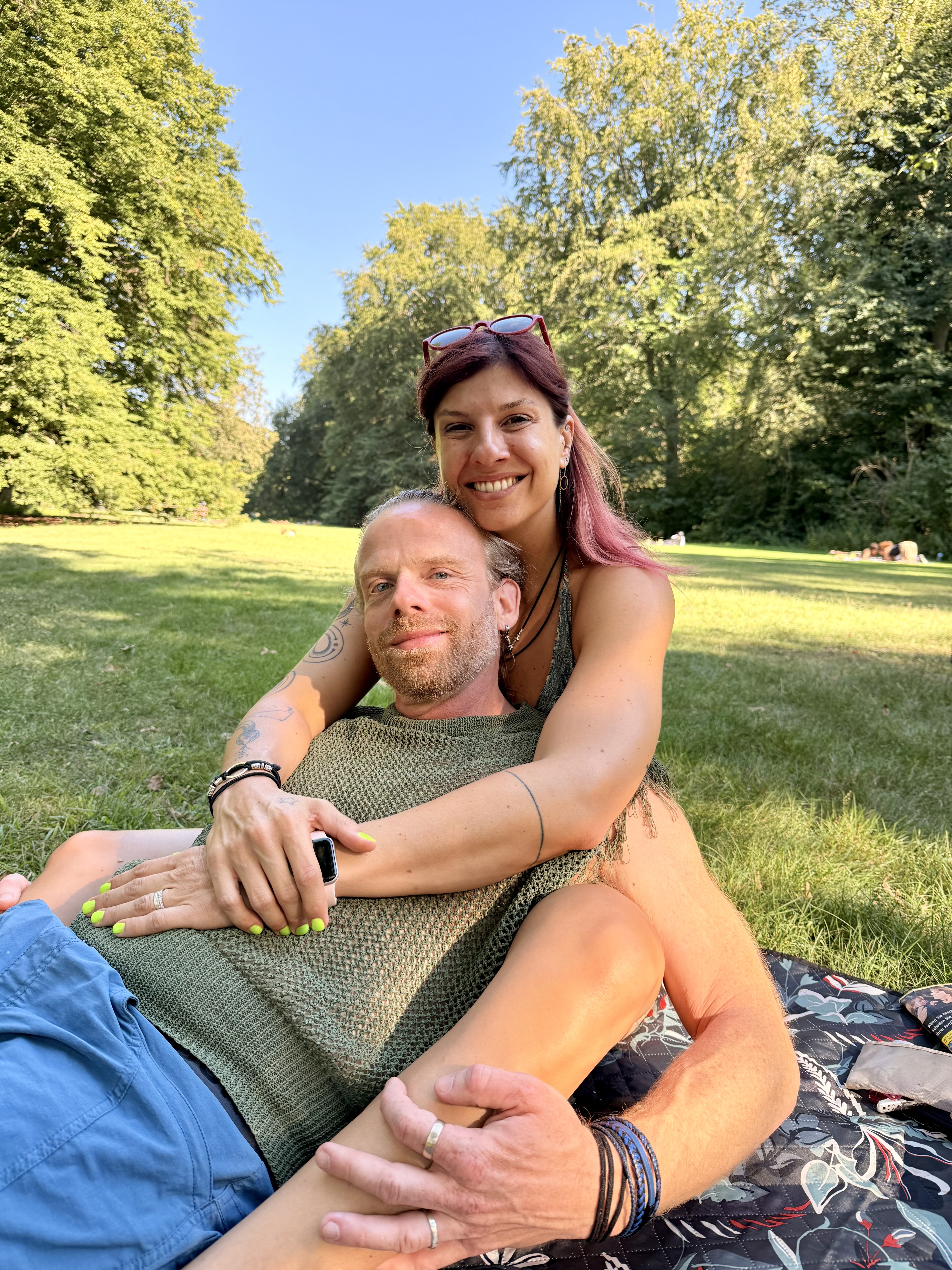Chiara and Will relaxing in a park
