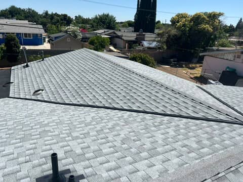 "Side-by-side image showing solar panels before and after professional cleaning, highlighting the contrast between dirt-covered and spotless surfaces."