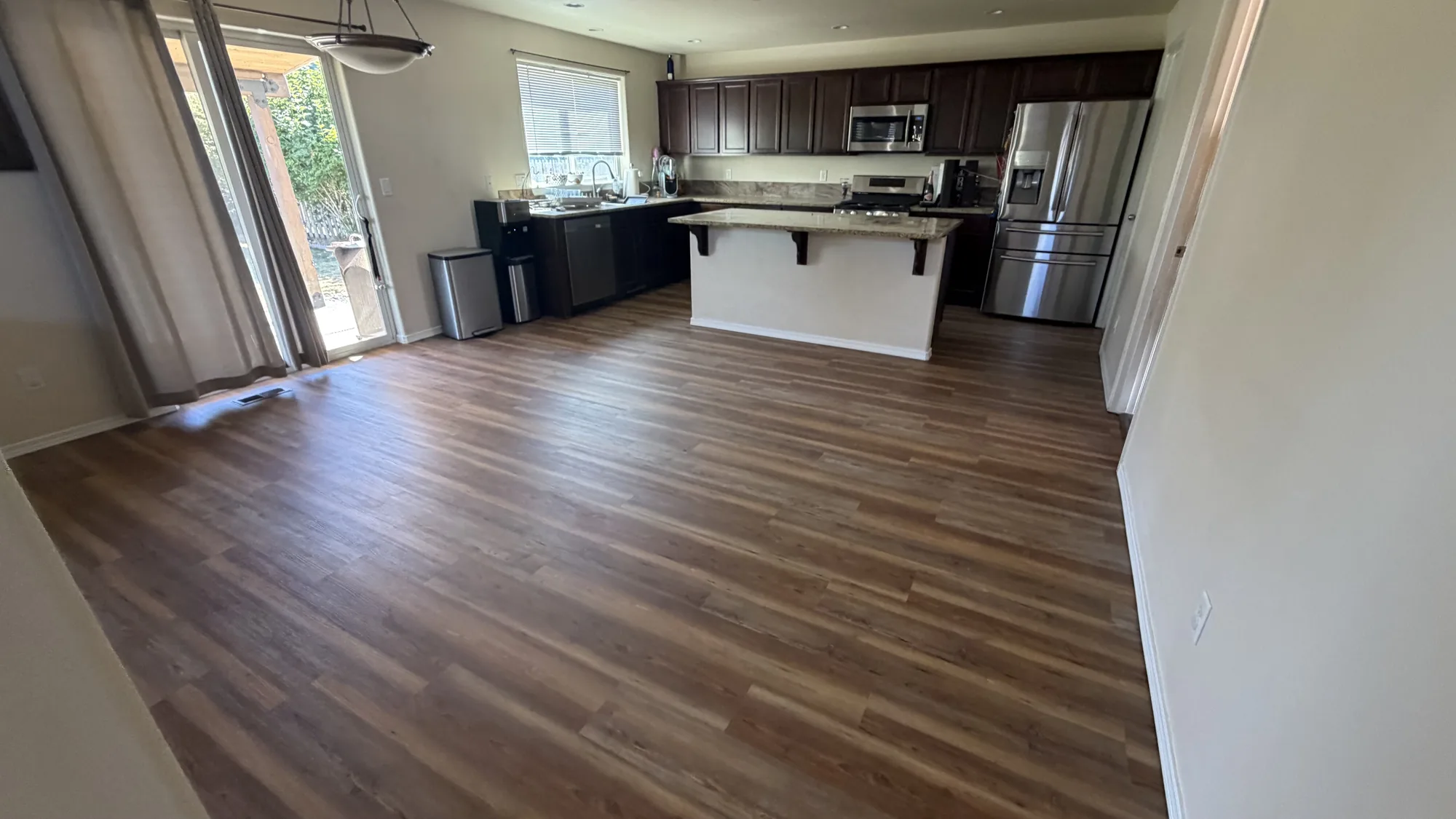 Flooring and kitchen remodel with new flooring and updated cabinetry