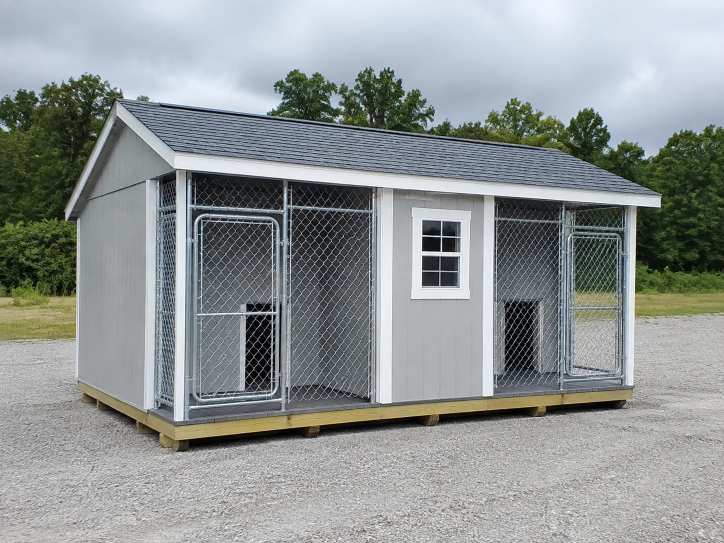 Portable double-run dog kennel available from Simply Sheds of Prattville