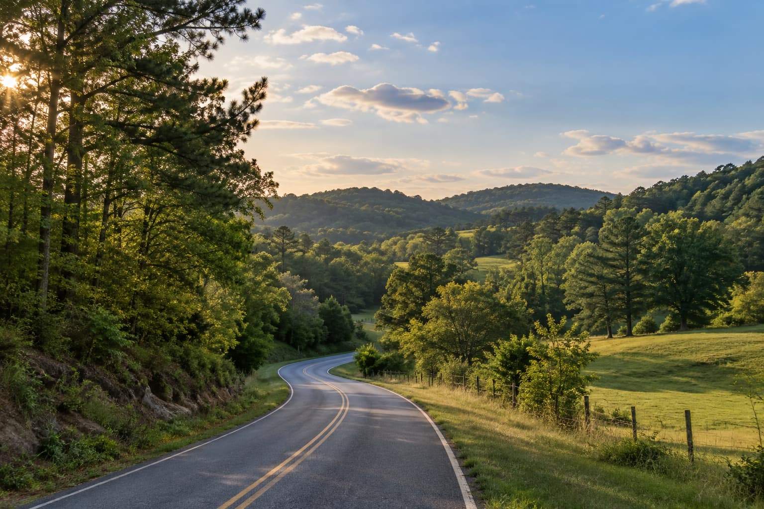 Rolling wooded hills and a quiet road near Ashville, Alabama