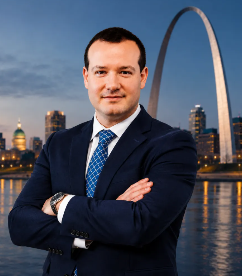 Alex Shenderov, St. Louis attorney and Authority Systems client, in front of the Gateway Arch