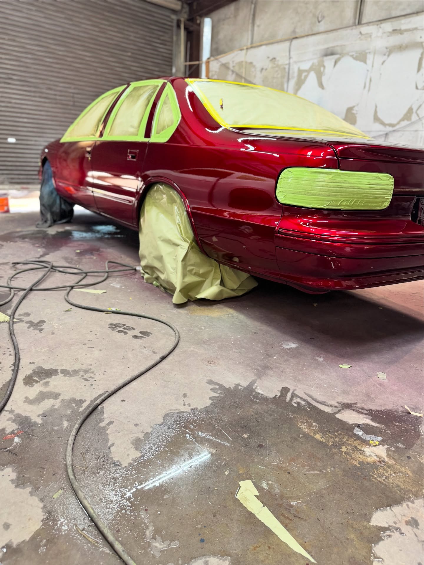 Candy red full respray on Chevy Impala in Mobile AL
