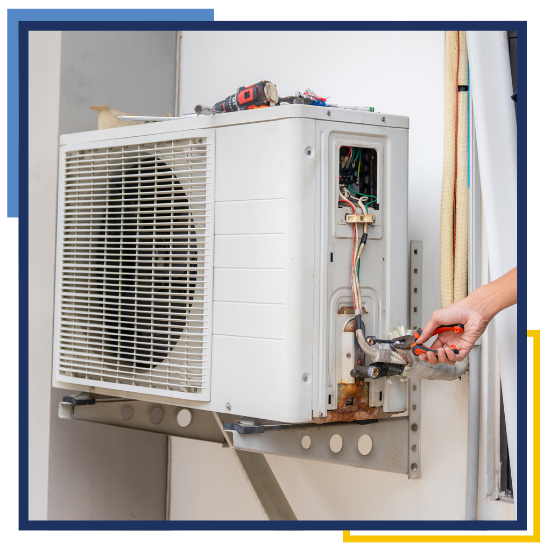 Technician providing HVAC repair in the Woodlands, TX at a residential property