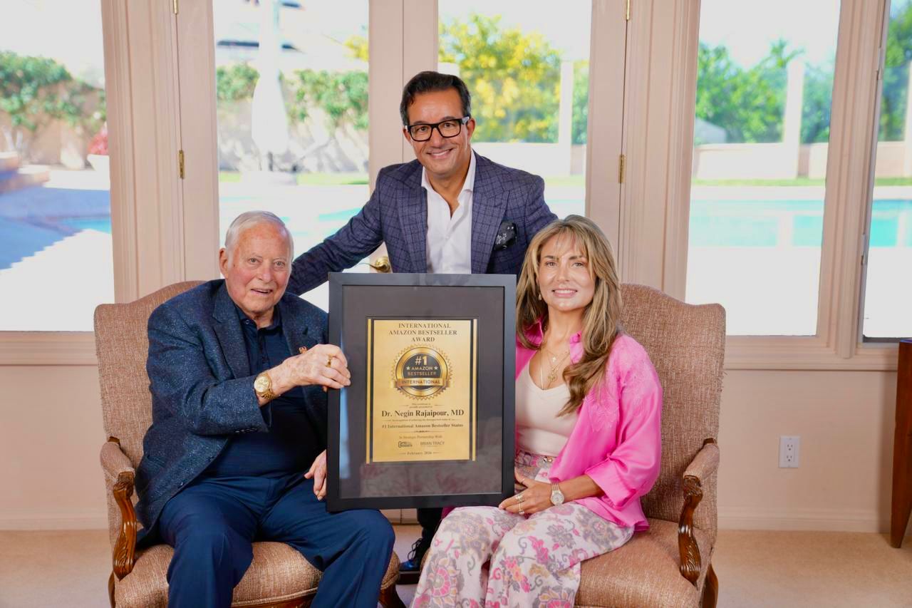 Dr. Negin Rajaipour holding bestseller award