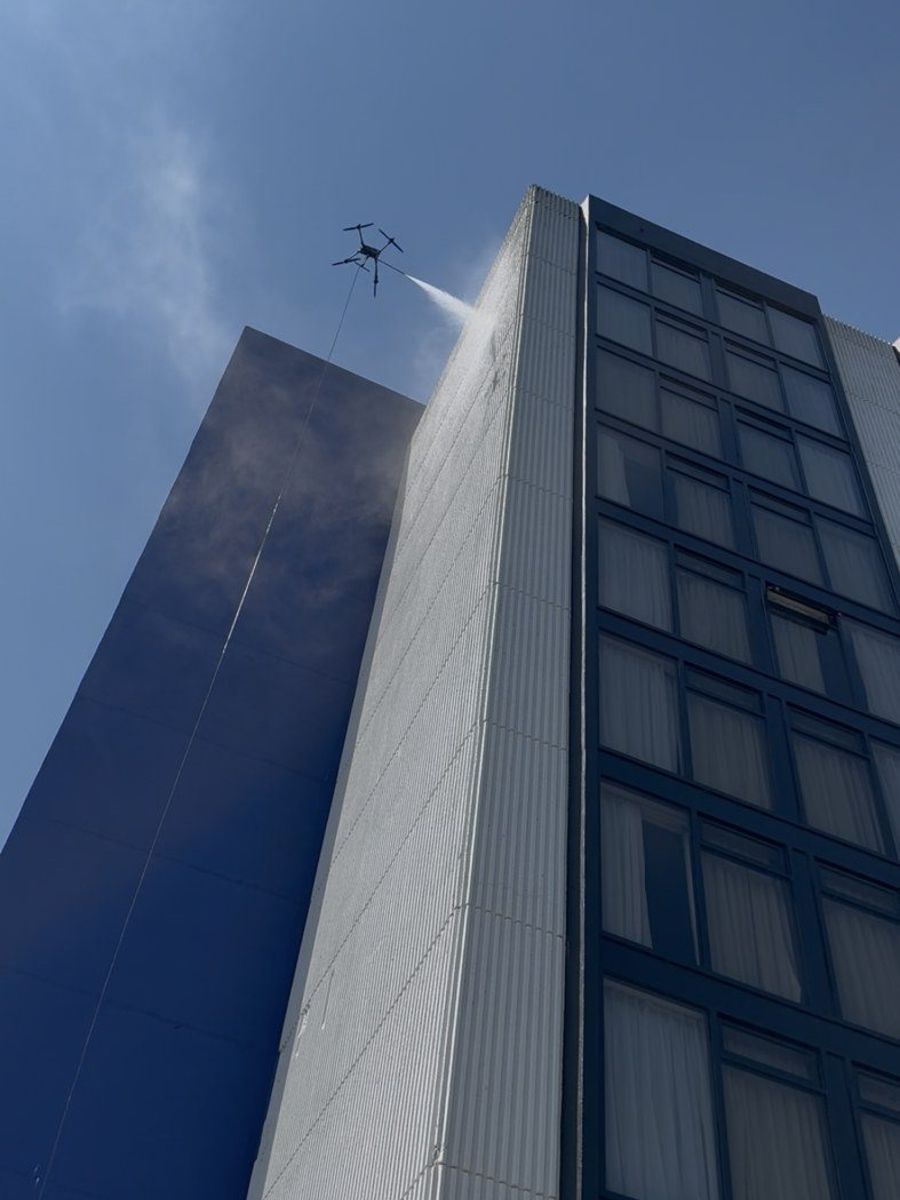Drone working on a hotel tower