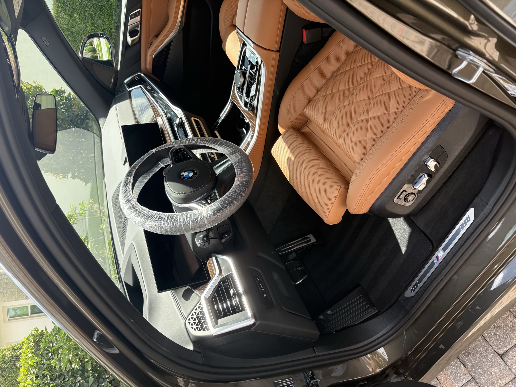 BMW interior &mdash; cognac diamond-stitched leather, full detail
