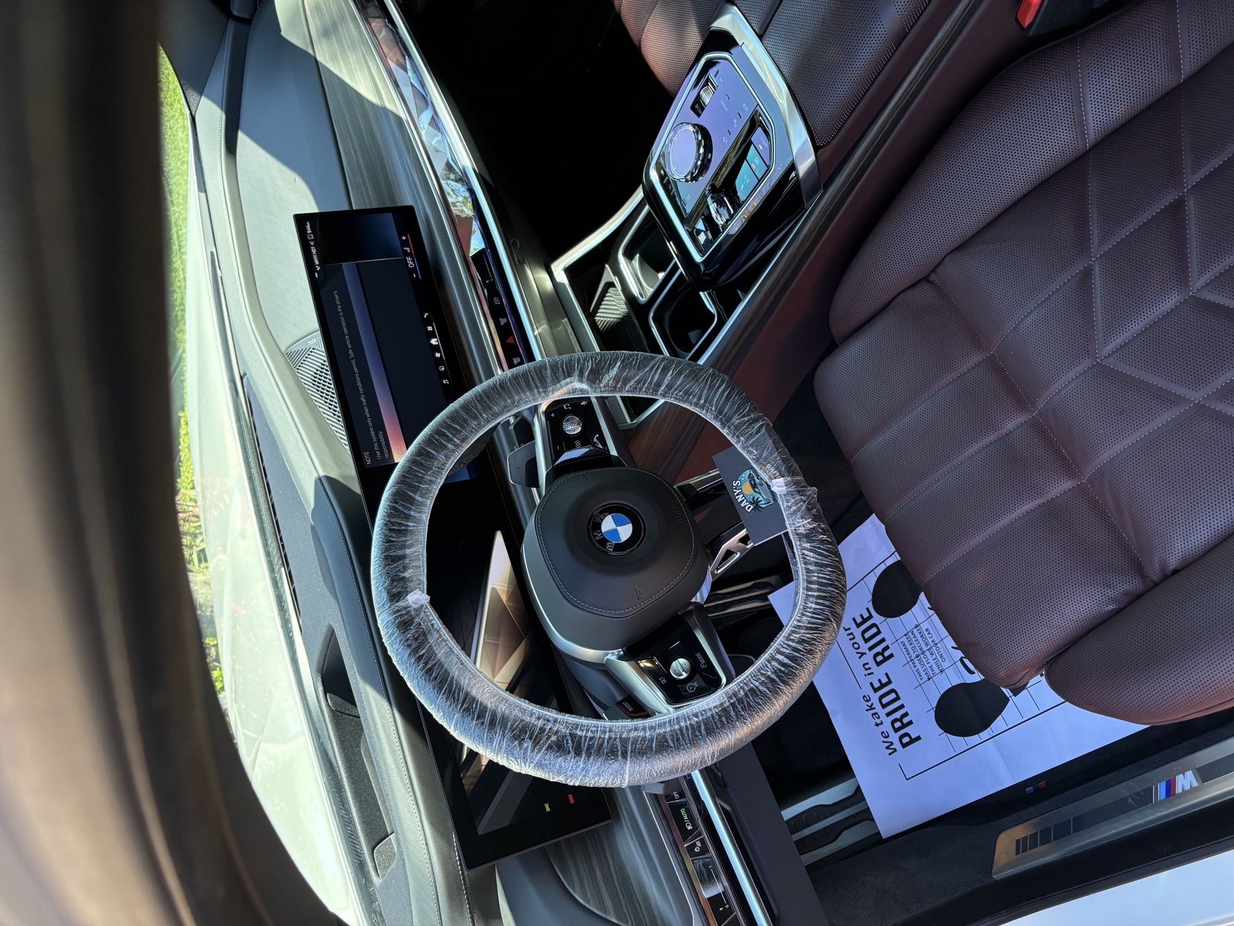 BMW interior detailed with Dany's branded floor protection
