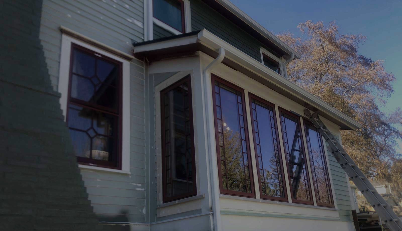 Historic home with new leaded divided-lite windows installed by Mitchell Window & Door