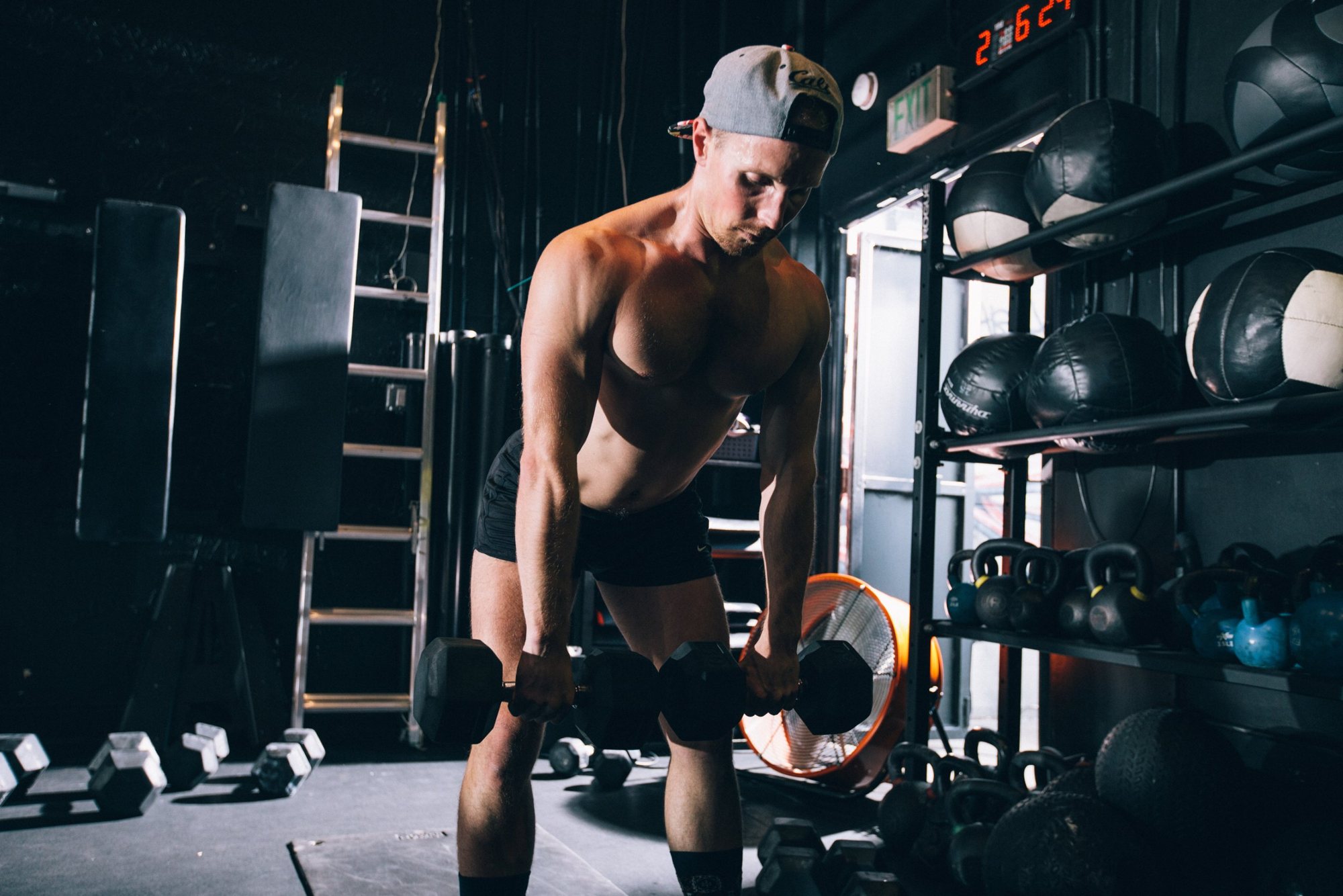 A member doing a dumbbell row