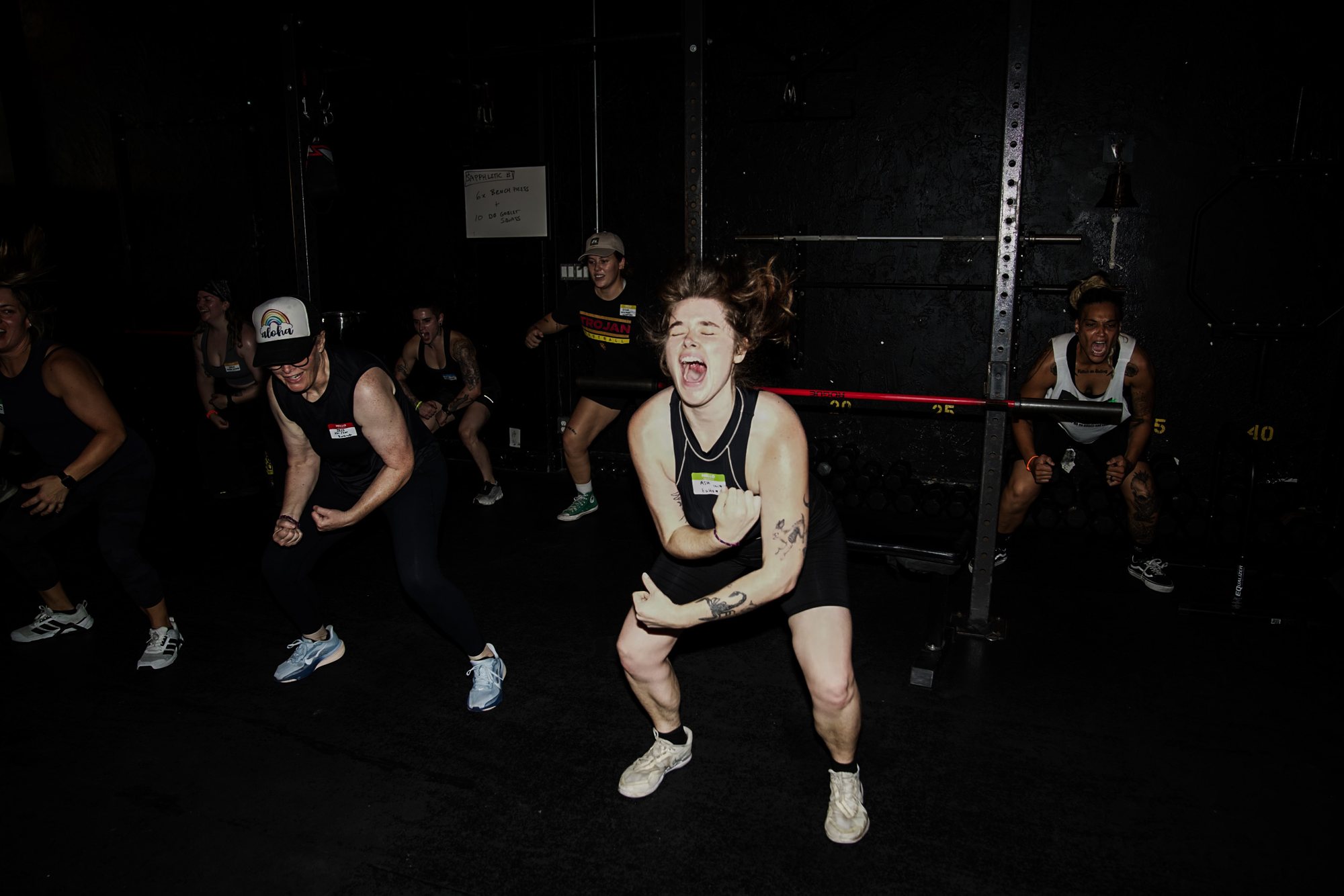 A strength class squatting together at The Phoenix Effect in Hollywood