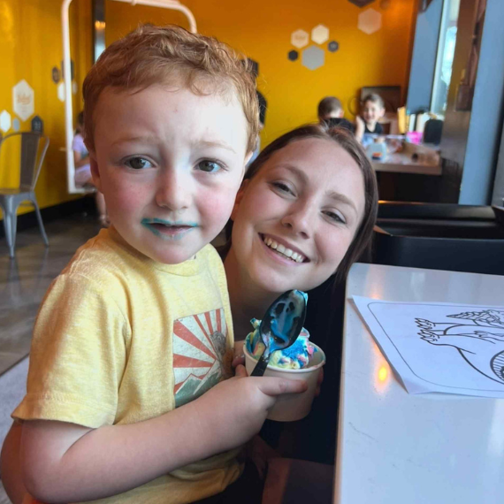 Happy toddler girl reaching developmental milestones through early intervention