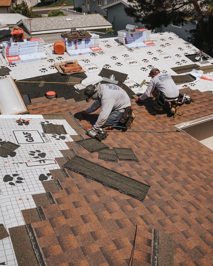 Two-story home with a new charcoal architectural shingle roof in Manchester by IronPeak Roofing